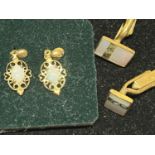 A pair of yellow metal and opal earrings, and a pair of MOP cufflinks