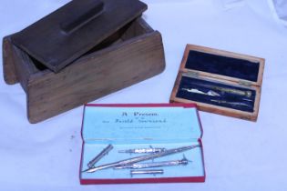Two vintage technical drawing sets and a treen box
