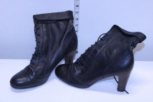 A new pair of ladies leather boots size 7