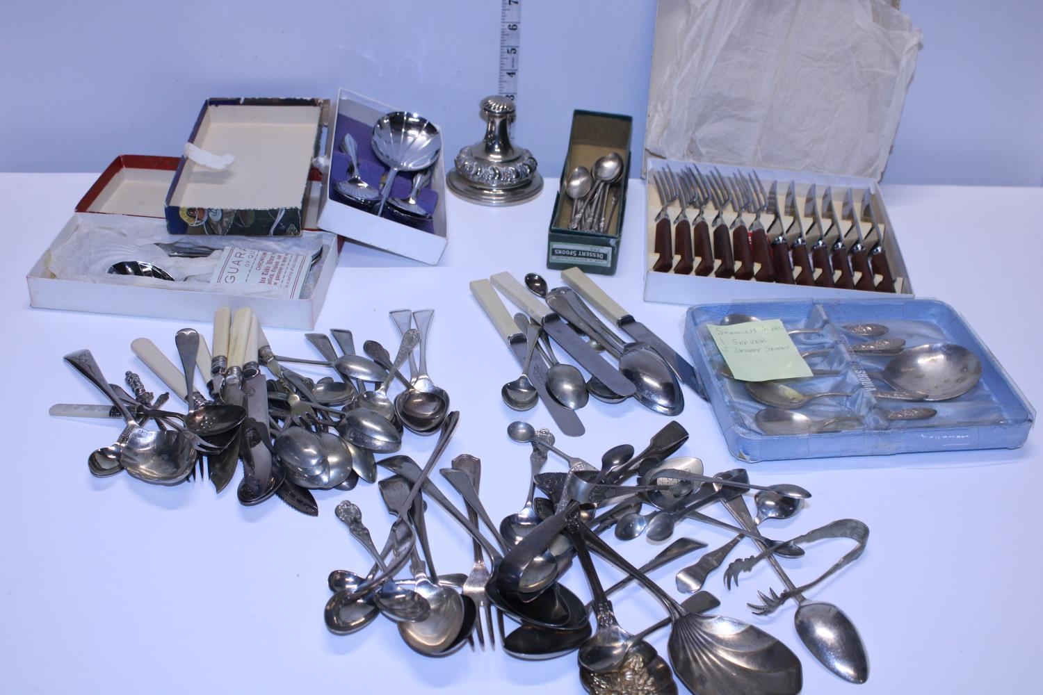 A job lot of boxed vintage cutlery and assorted flatware