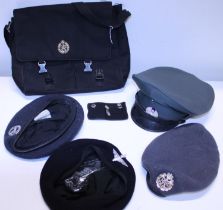 A job lot of assorted military caps and RAF bag