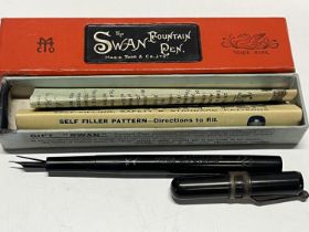 A boxed Swan fountain pen with a 14ct gold nib
