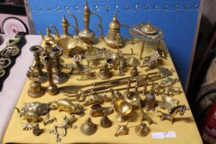 A large selection of assorted brassware
