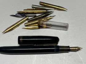 A Waterman's 503 fountain pen with 14ct gold nib along with spare nibs