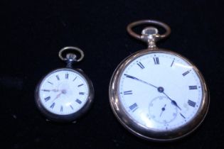 A gold plated pocket watch and a ladies small white metal fob watch