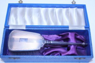 A boxed silver hairbrush hallmarked for Birmingham 1924