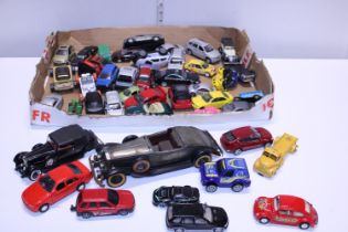 A job lot of play worn die-cast models including Dinky
