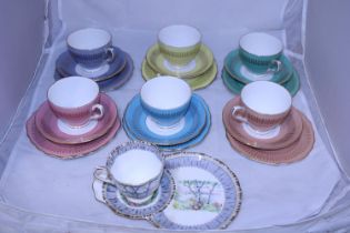 A selection of Colclough bone china trio's and a Royal Albert tea for one set