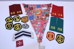 A job lot lot of Russian enamel badges and patches etc