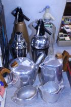 A selection of vintage soda syphons and picquot ware