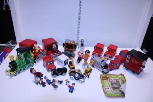 A selection of Postman Pat and other collectables