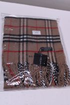 A new with tags Burberry 100% lambs wool tan shawl 206 x 70cm