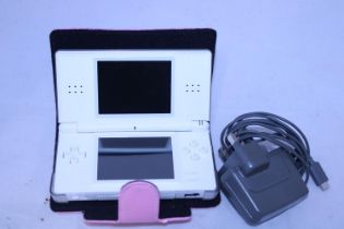 A Nintendo DS and charger (untested)