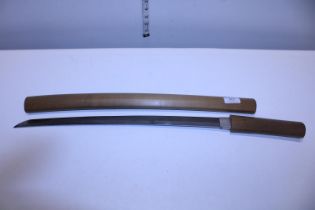 A wooden handled and scabbard short bladed Samurai sword, 48cm blade length, measured from Habaki,