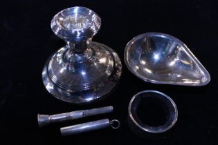 A selection of hallmarked silver items including a dwarf candlestick