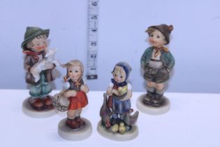 Four assorted Goebel figurines