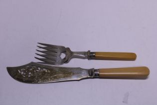 A hallmarked silver collared fish knife and fork