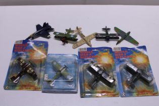 Four boxed and several other military aircraft die-cast models