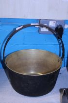A heavy brass jam pan. No shipping
