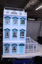 A large Georgian style dolls house, shipping unavailable