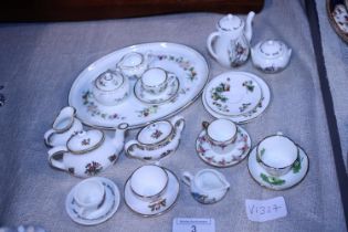 A job lot of miniature ceramics including Coalport, Wedgewood etc