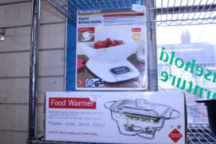 A boxed set of digital scales and boxed food warmer (unchecked)
