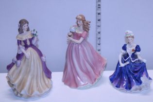 Three ceramic lady figurines