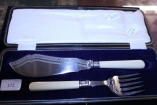 A case set of fish knives and forks with hallmarked silver collars