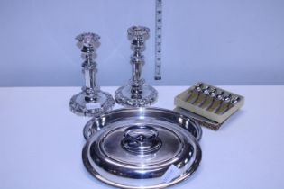 A good pair of quality plated candlesticks and other plated items including Walker & Hall