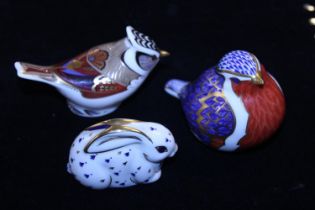 Three assorted Crown Derby paperweights (one with no stopper)