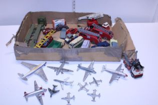 A job lot of play worn Dinky die-cast models including fire engins and planes etc