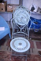 Four metal fold up garden chairs, shipping unavailable