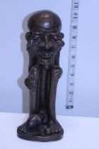 A antique wooden carved fertility figure