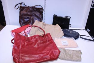 A job lot of ladies designer bags