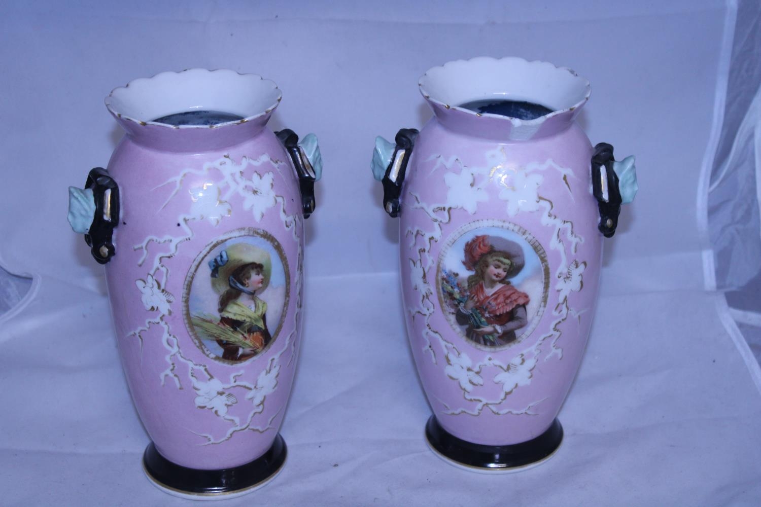 A pair of Edwardian vases a/f