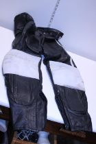 A pair of leather motorbike trousers size 46