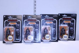 Four boxed Starwars figurines