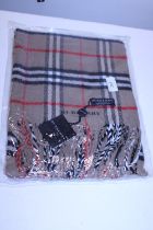 A new with tags Burberry 100% lambs wool tan shawl 206 x 70cm