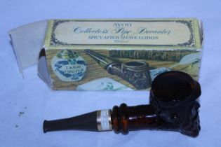 A vintage Avon 'Spicy' aftershave lotion in the form of a pipe