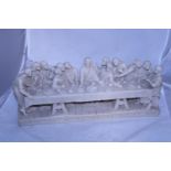 A heavy resin last supper figural group L42cm