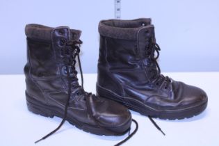 A pair of combat boots size 10 (worn)