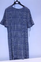 A new with tags ladies Calvin Klein dress size 4