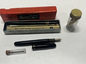 A Waterman 305 fountain pen with 14ct gold nib and a Swan fountain pen with 14ct gold nib