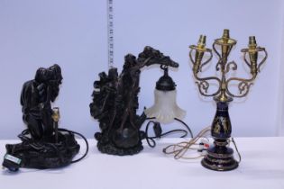 A selection of three assorted table lamps