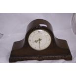 A wooden cased mantle clock (wind up movement), shipping unavailable
