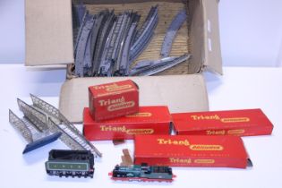 A selection of model railway track, empty boxes and other models