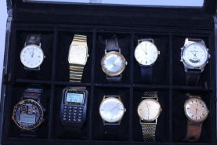 A watch display case and contents of watches