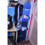 A US40 snow board in case, snowboard measures 155cm shipping unavailable