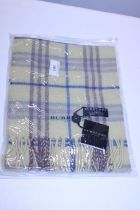 A new with tags Burberry 100% lambs wool yellow long scarf 120 x 23cm