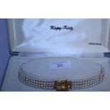 A boxed Kopy-Kat costume jewellery choker